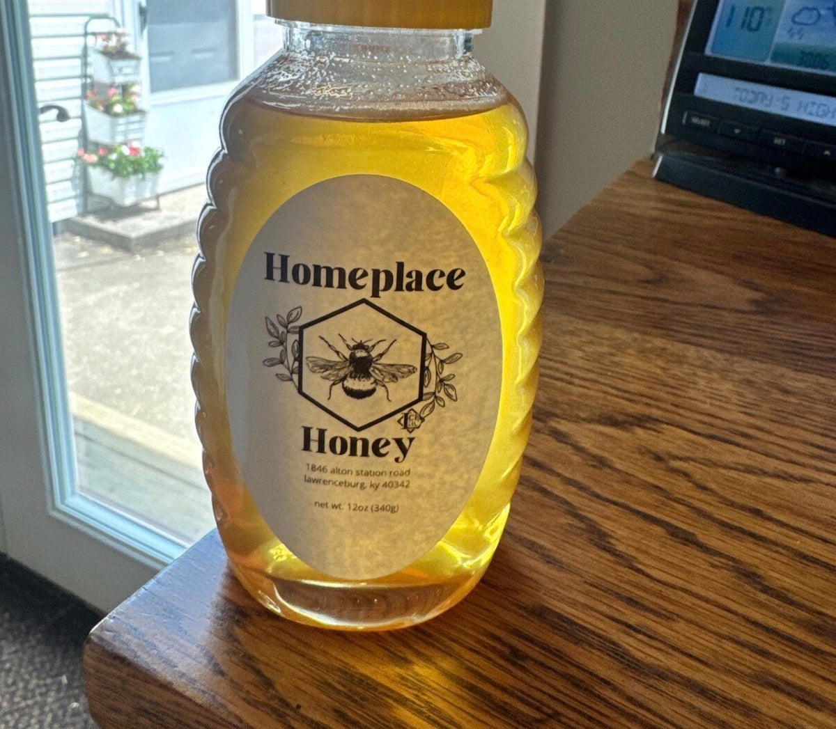 Honey bottle with oval label