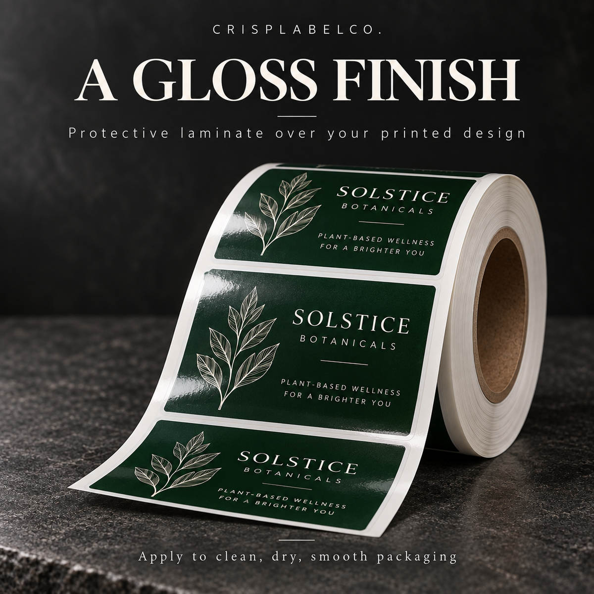 Gloss laminate over a custom printed rectangular label roll — illustrative close-up